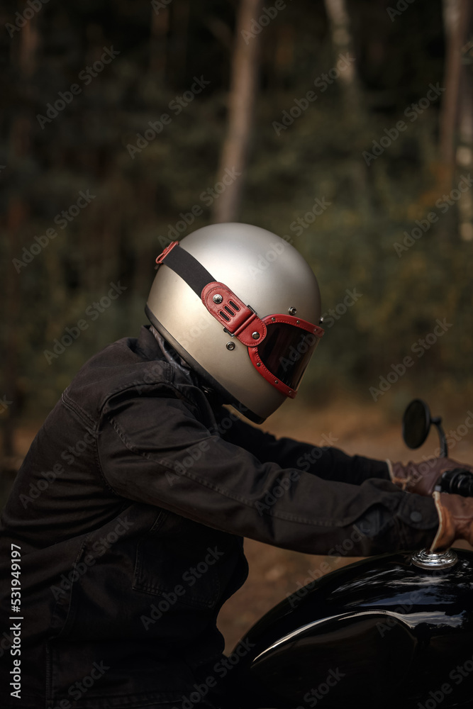 Close-up photo of a motorcyclist in a helmet