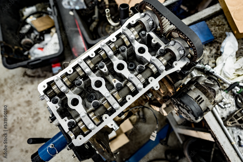 Disassembled car engine block at car service station Disassembled car engine block at car service station