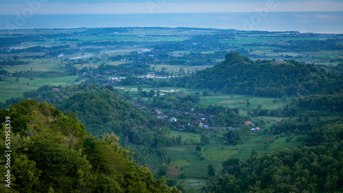 Bird's eye view of Situbondo regency east java with sprawling mountains © Ralfa Padantya