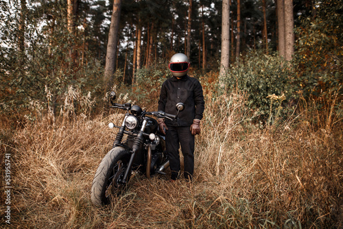 Photo of a motorcyclist in the forest