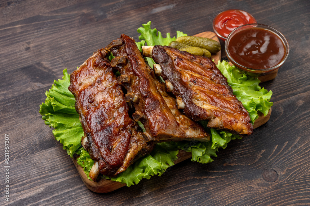 Grilled ribs with barbecue sauce and ketchup	