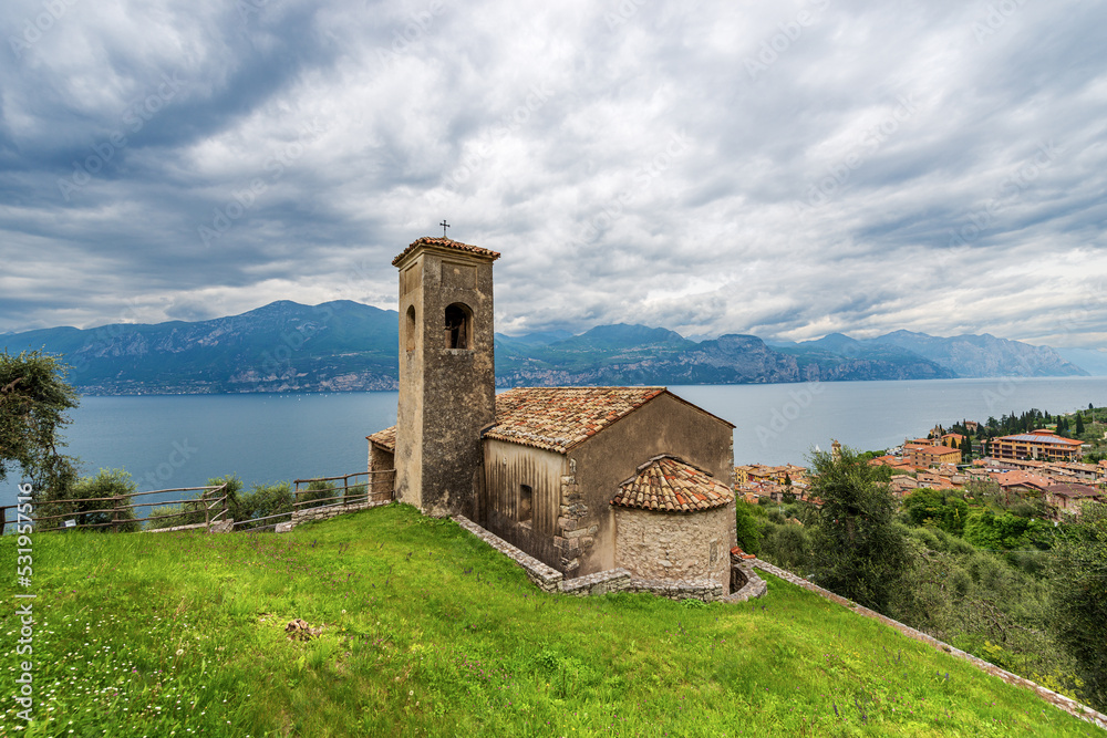 Panorama of Lake Garda and small ancient Church in Romanesque style, San Antonio Abate (Saint Anthony Abbot), XIII-XIV century, Biaza, Brenzone sul Garda, Lake Garda, Verona, Veneto, Italy, Europe.