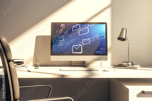 Modern computer monitor with postal envelopes hologram. Electronic mail and spam concept. 3D Rendering