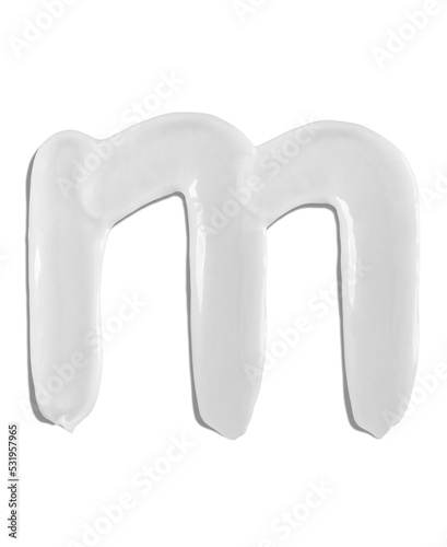 Alphabet Letter m, Cream moisturiser smudge texture smear letter written with white liquid beauty product