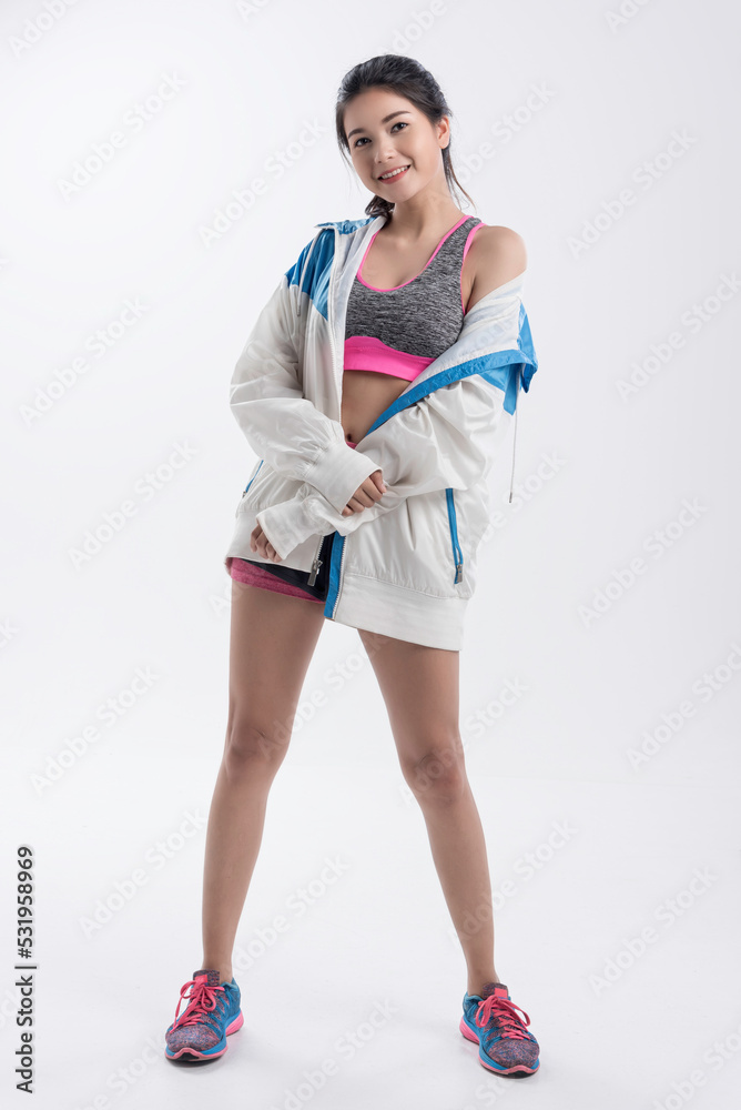 Image of fitness woman in sports clothing, look strong ,happy, fit and healthy. Young female model with muscular body. Workout everyday help good health and good shape. Image of fitness woman in sports clothing, look strong ,happy, fit and healthy. Young female model with muscular body. Workout everyday help good health and good shape.
