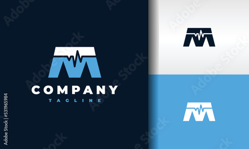 letter M heartbeat logo