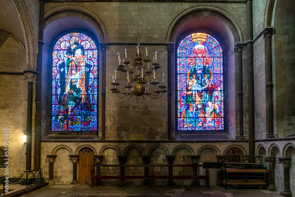 close-up view of historic stained glass windows inside the Canterbury Cathedral close-up view of historic stained glass windows inside the Canterbury Cathedral