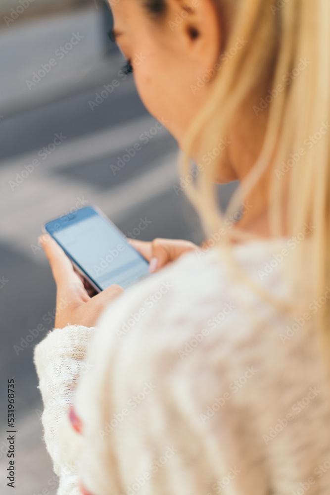 Young woman using smart phone Young woman using smart phone