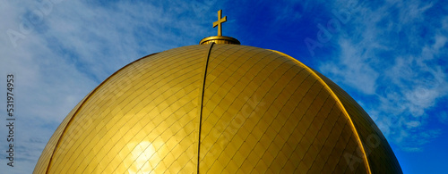 Slika na platnu Gold Dome on Christian Church with Cross with Blue Sky and Clouds