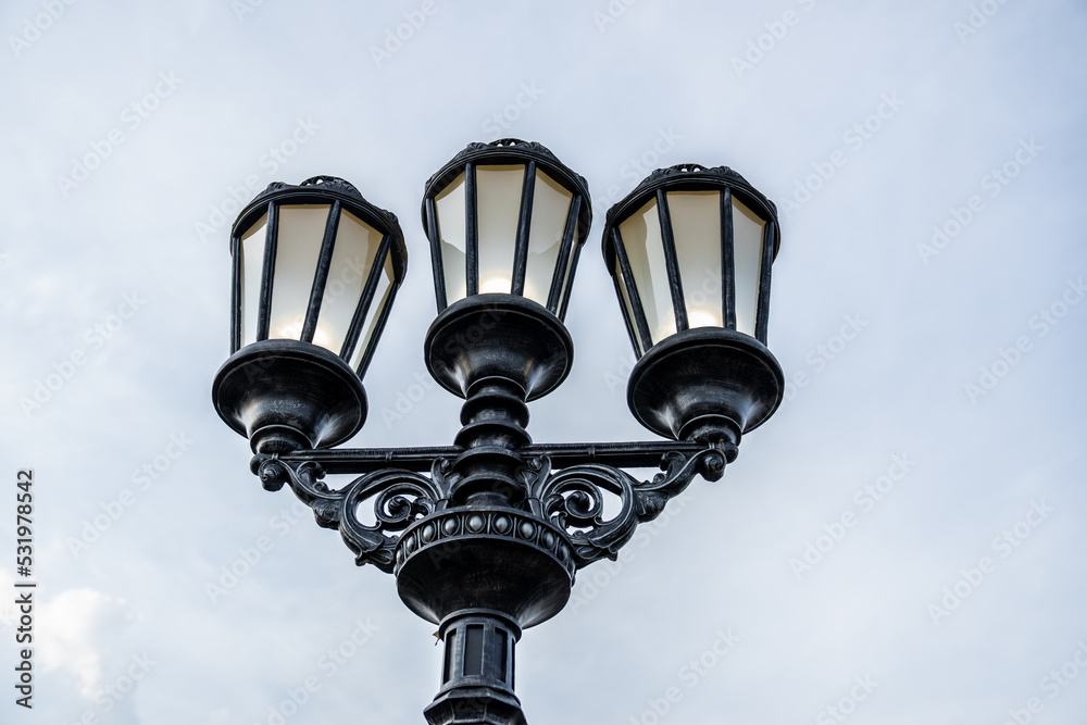 Beautiful street lamp on the background of a beautiful clear sky. Street lighting Beautiful street lamp on the background of a beautiful clear sky. Street lighting