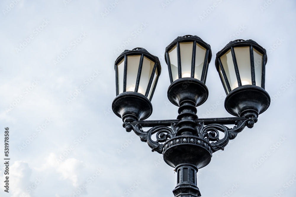 Beautiful street lamp on the background of a beautiful clear sky. Street lighting Beautiful street lamp on the background of a beautiful clear sky. Street lighting