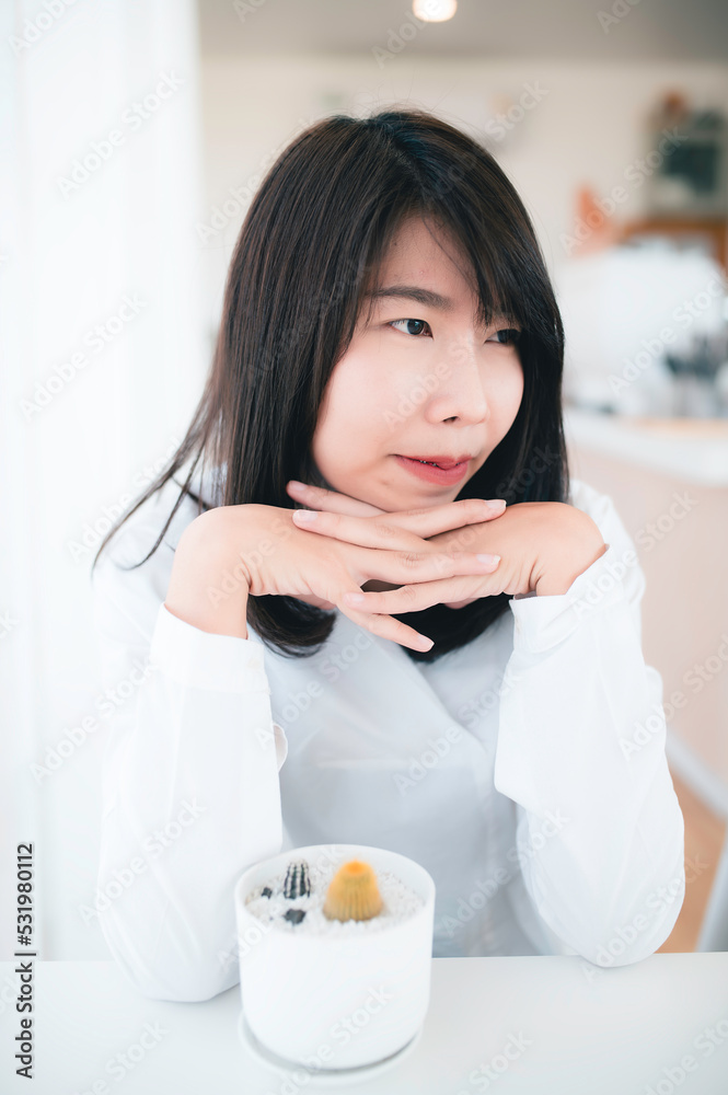 Portrait of Young beautiful asian woman in the coffee shop Portrait of Young beautiful asian woman in the coffee shop