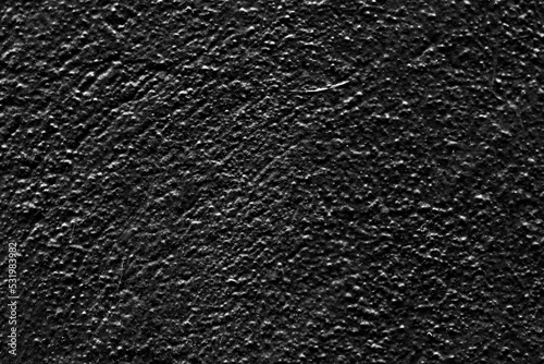 black wall rough abrasive surface texture closeup photo