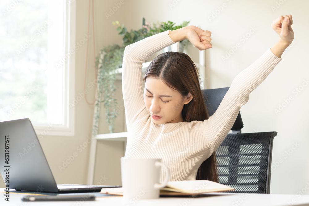 Body muscles stiff problem, ache asian young woman, girl pain back, stretch while sitting work on chair at home, holding massaging rubbing, hurt or sore, Healthcare people, office syndrome . Body muscles stiff problem, ache asian young woman, girl pain back, stretch while sitting work on chair at home, holding massaging rubbing, hurt or sore, Healthcare people, office syndrome .
