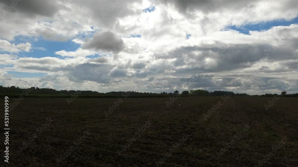 clouds over the field clouds over the field