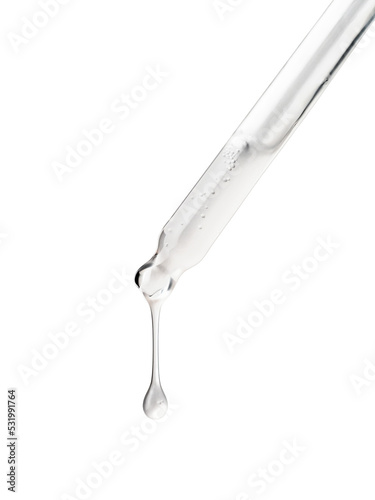 Clear essential serum oil dripping from dropper isolated on white background. Clipping path