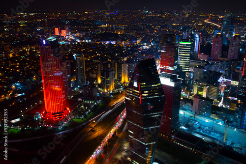Istanbul City Night Aerial Image, Skyscrapers and Bosphorus Bridge photo