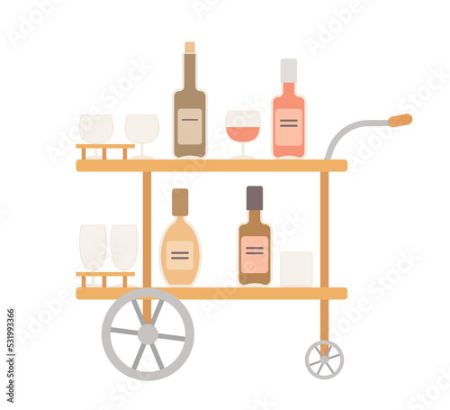 Cute bar cart with alcohol. Home interior concept