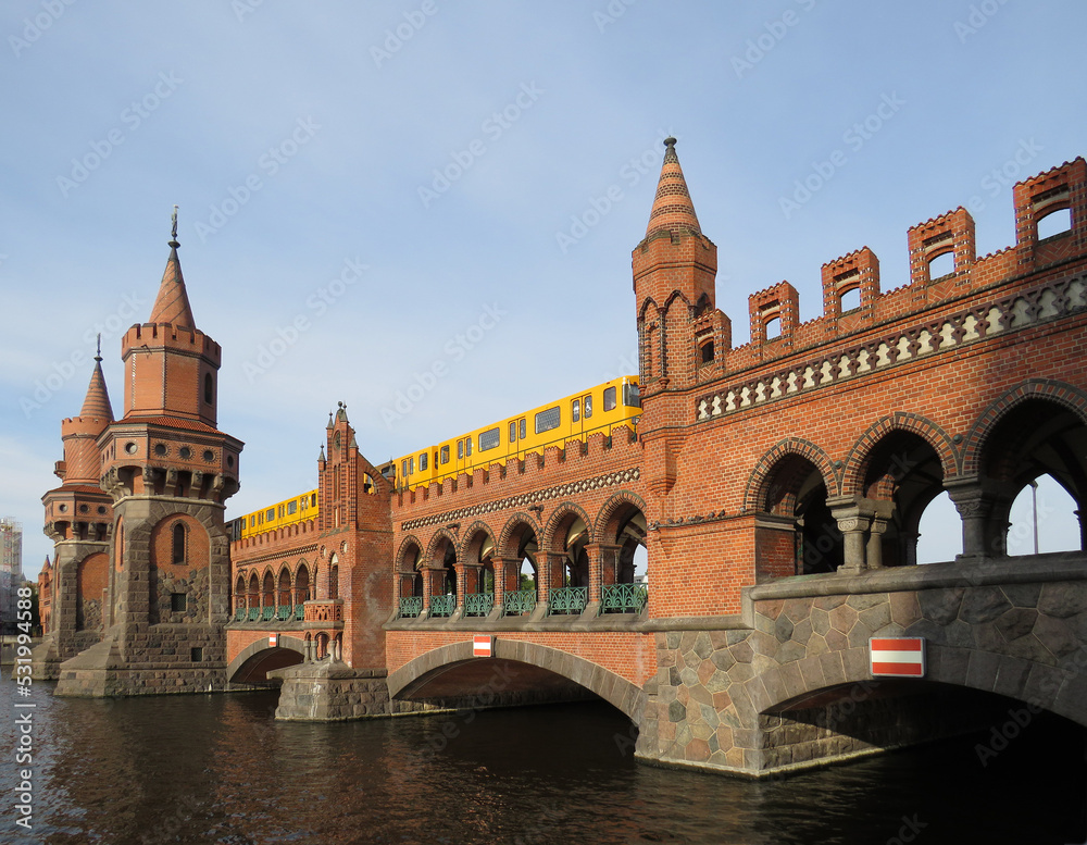 General view of the Oberbaum Bridge over the Spree River in the city of Berlin. Germany.