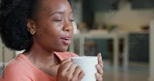 Relax, coffee or tea drink with girl on break to enjoy warm and delicious beverage alone in home. Black woman amazed, relieved and impressed with strong aroma taste in drinking mug for chill time.