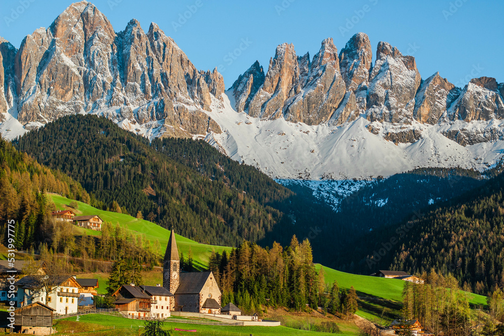 Italinan Dolomites with small city on the front side
