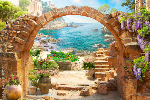 An old stone arch with a view of the seascape. Wallpaper on the wall.