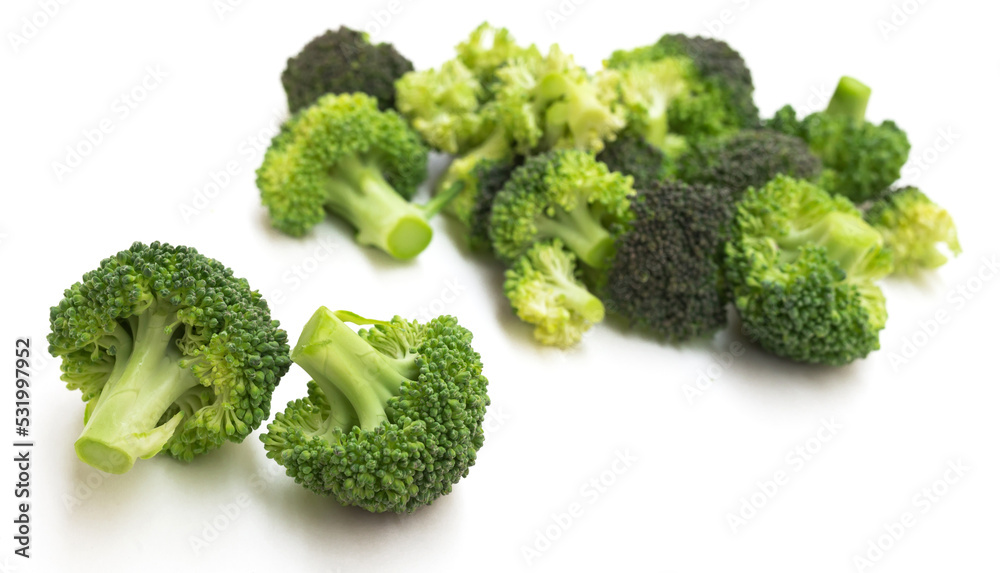 appetizing broccoli inflorescences on a white background appetizing broccoli inflorescences on a white background