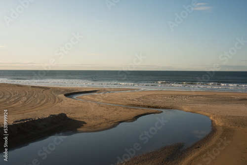 Fototapeta Naklejka Na Ścianę i Meble -  A beautiful shot of the sandy shore in the Atlantic ocean