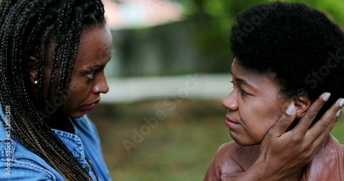 Εκτύπωση καμβά Depressed African woman, friend helping compassionate hug