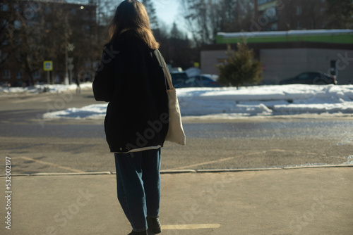 Wallpaper Mural Girl is waiting for bus. Student at bus stop in Russia. Girl by road. Torontodigital.ca