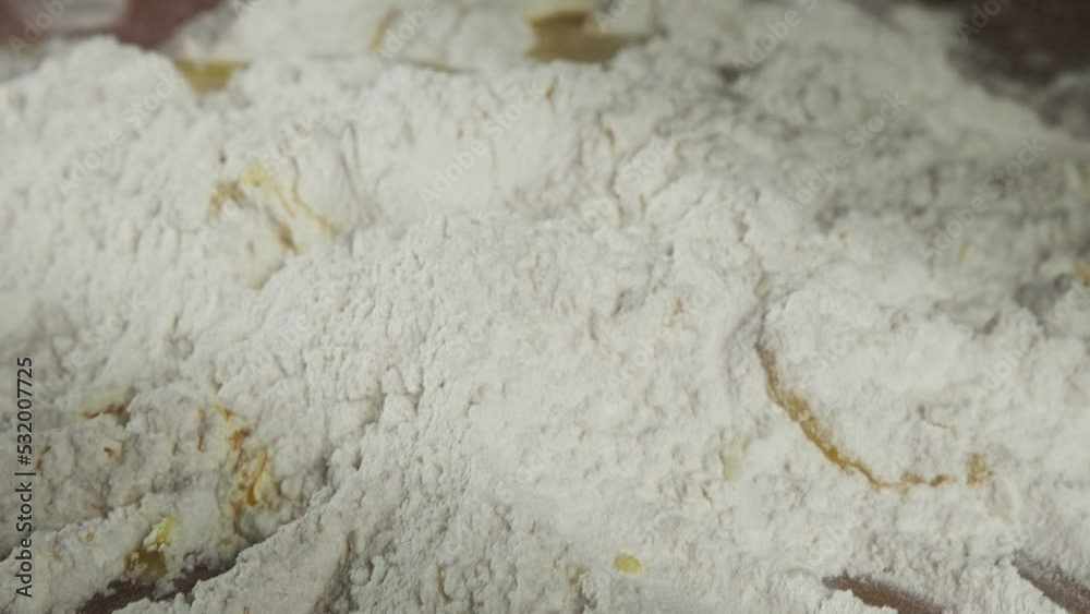 Chef baker hands kneading dough on table Chef baker hands kneading dough on table