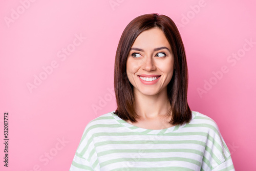 Closeup photo of young nice cute perfect girl wear striped shirt smile interested look empty space shopping isolated on pink color background