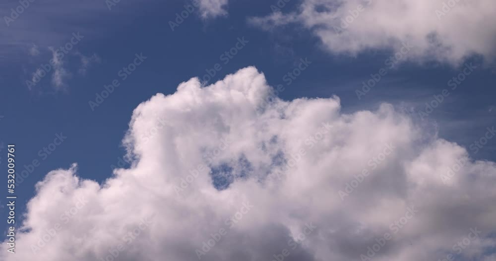 Clouds floating across the sky in the daytime Clouds floating across the sky in the daytime