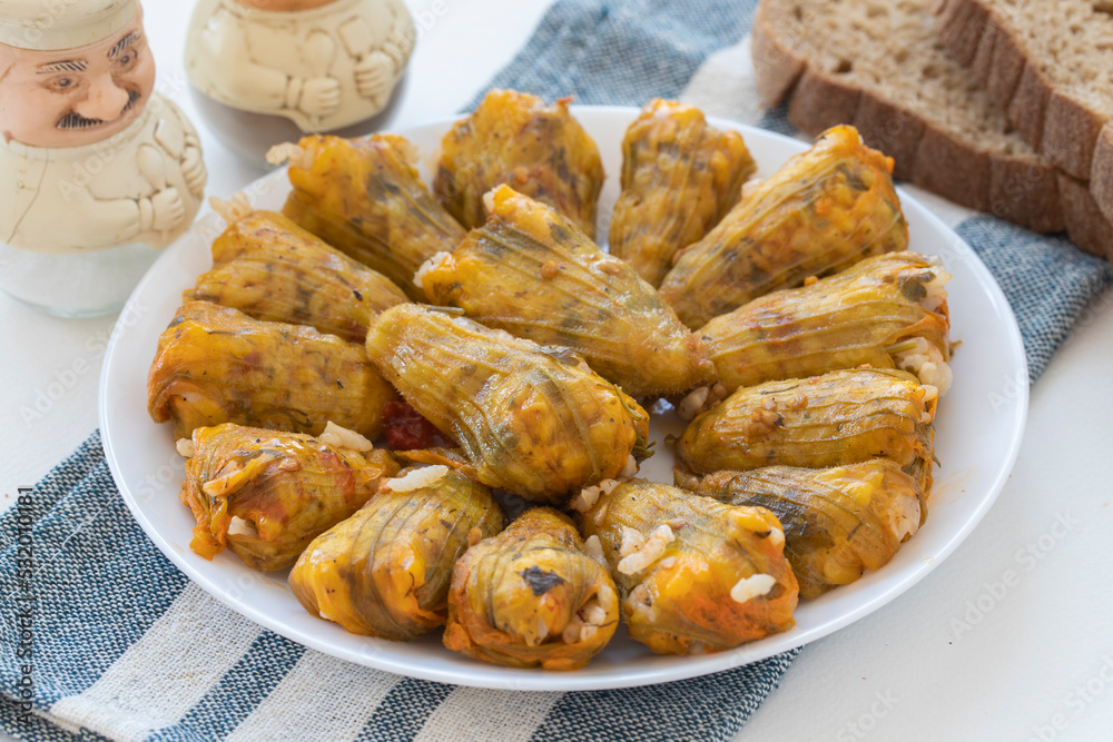 Traditional delicious Turkish - Greek cuisine, Turkish food; Stuffed zucchini flowers (Turkish name; kabak cicegi dolmasi)