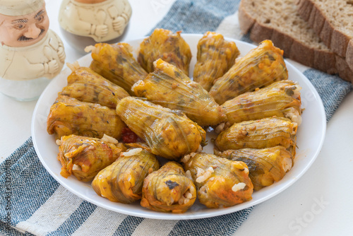Traditional delicious Turkish - Greek cuisine, Turkish food; Stuffed zucchini flowers (Turkish name; kabak cicegi dolmasi) photo