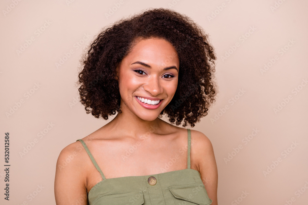 Close up photo of pretty cute lady beaming bright grin smile after toothcare beauty procedure isolated on beige color background Close up photo of pretty cute lady beaming bright grin smile after toothcare beauty procedure isolated on beige color background