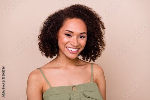 Close up photo of pretty cute lady beaming bright grin smile after toothcare beauty procedure isolated on beige color background