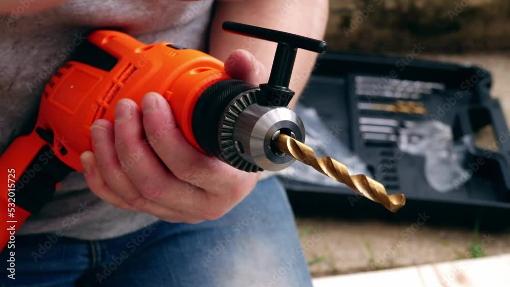 Fitting bit in electric power drill for diy 