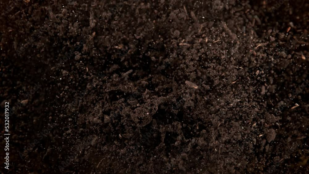Super Slow Motion Shot of Exploding Soil Towards Camera at 1000fps.