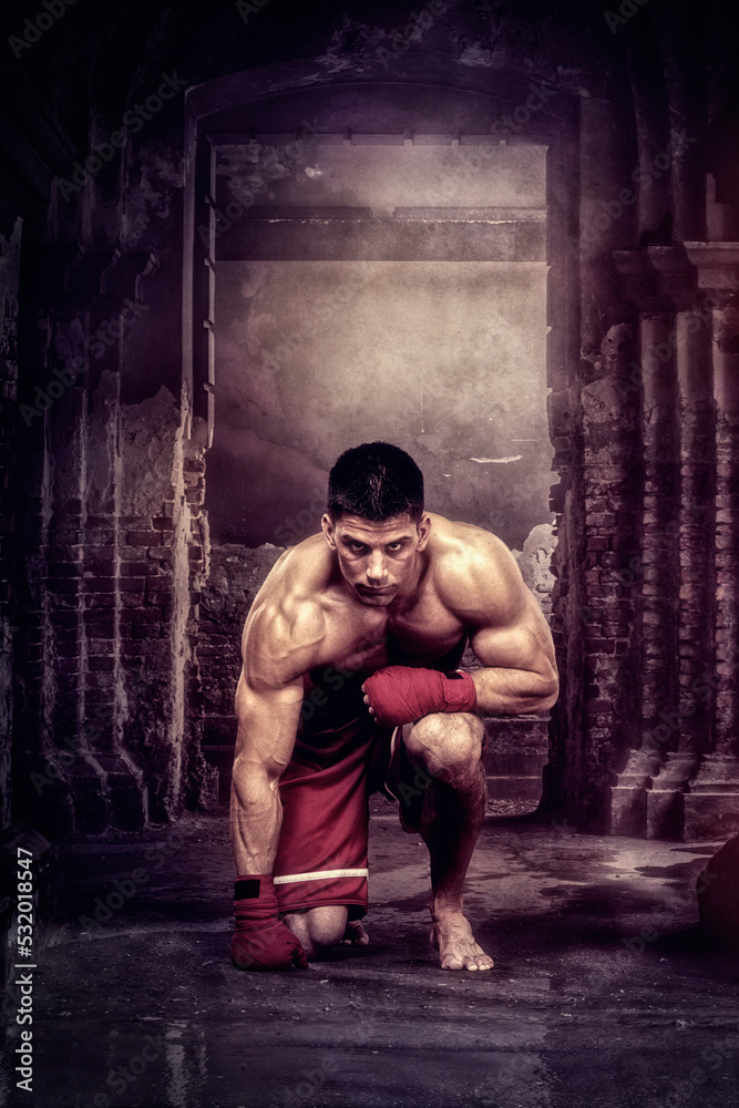 Fototapeta premium Street MMA Fighter in the Underground Arena is ready to Fight