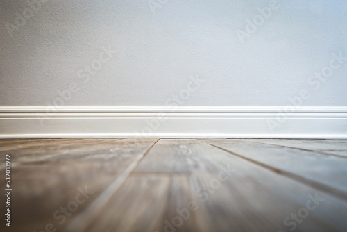 Wood look porcelain tile in planks on a kitchen floor in a recently renovated house