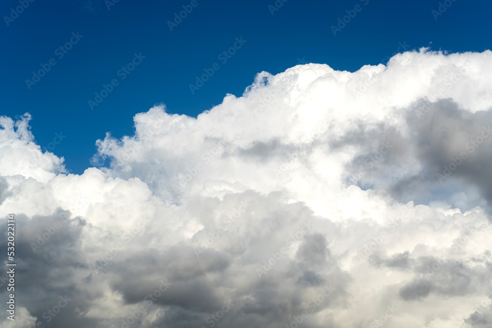 Cyclone in the sky. The movement of clouds in the blue sky. snow white clouds Cyclone in the sky. The movement of clouds in the blue sky. snow white clouds