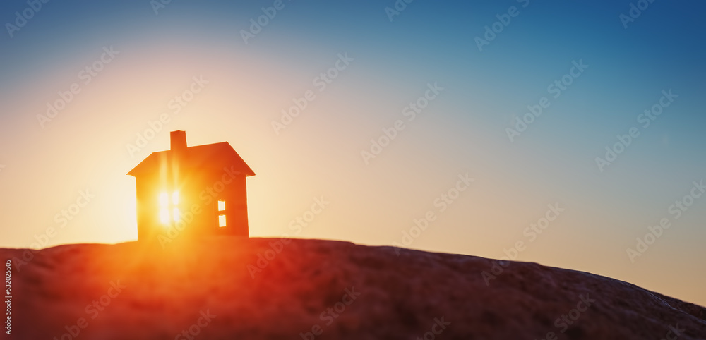 Model of a house standing on the ground on sunset evening. Model of a house standing on the ground on sunset evening.
