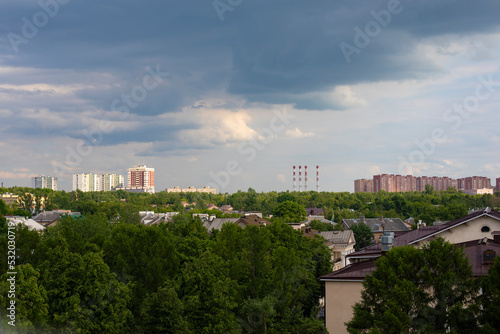 View of the city of Vidnoye, Moscow region Russia from the Ferris wheel in the city park. Shkolnaya Street, roofs of two-story residential buildings