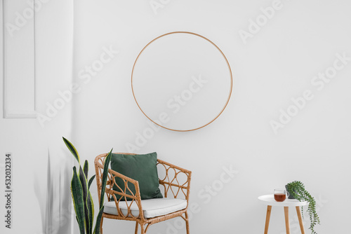 Table with cup of tea, armc...