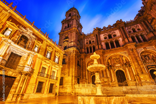 Illuminated Malaga Cathedral from Plaza Del Obispo at Dusk in Malaga, Andalusia