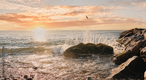 Beautiful sunset sea crash wave rock