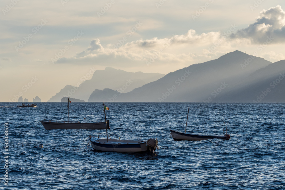 Sunset view from La Gavitella beach in Praiano, Amalfi Coast, Italy Sunset view from La Gavitella beach in Praiano, Amalfi Coast, Italy
