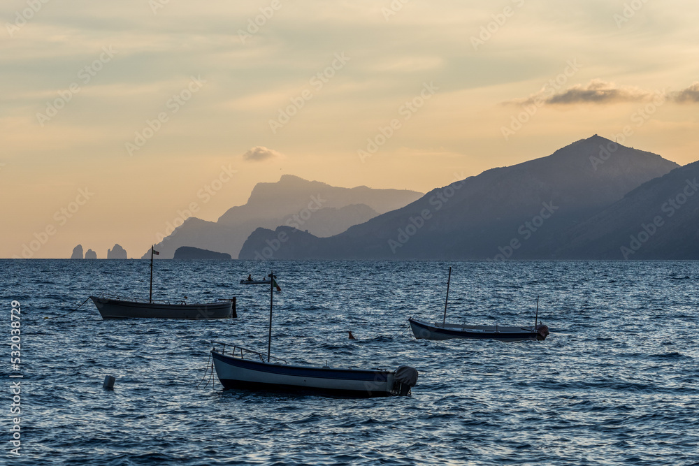 Sunset view from La Gavitella beach in Praiano, Amalfi Coast, Italy Sunset view from La Gavitella beach in Praiano, Amalfi Coast, Italy