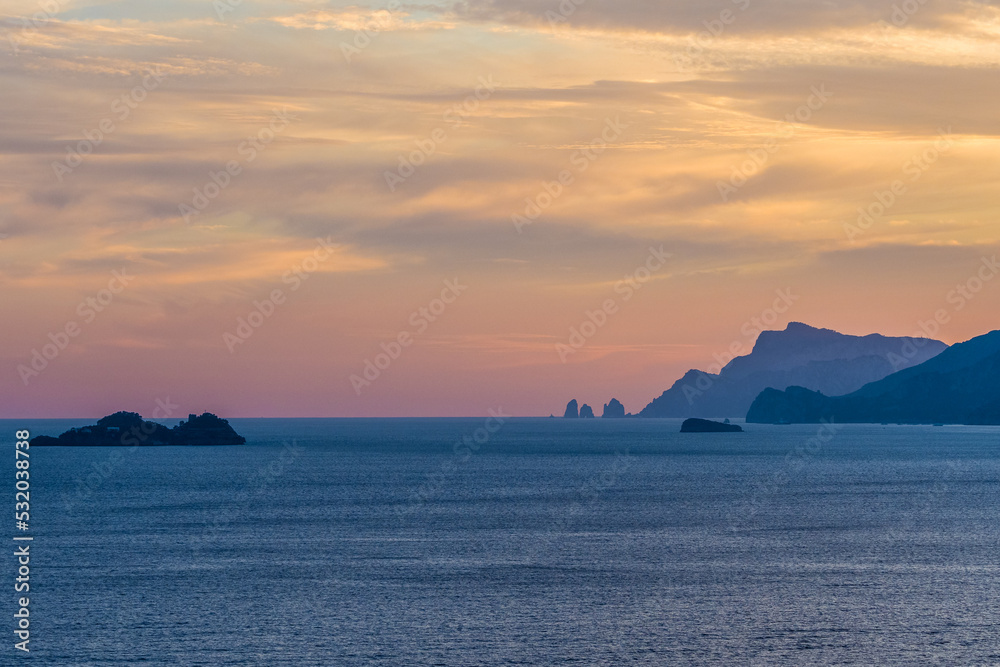 Sunset view from La Gavitella beach in Praiano, Amalfi Coast, Italy